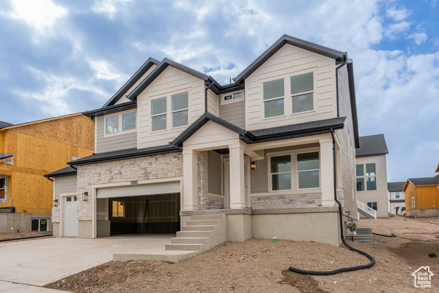 Craftsman-style house with a garage