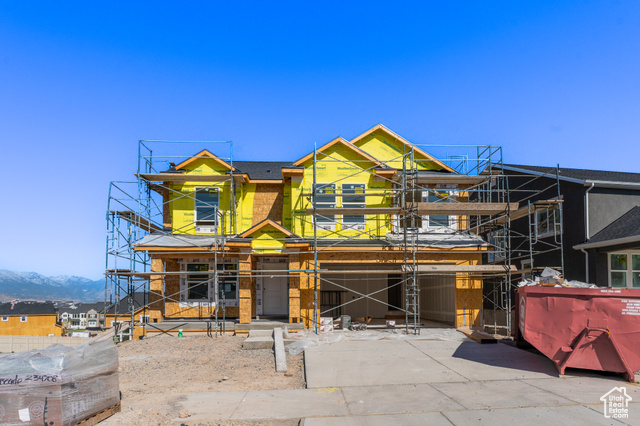 Property in mid-construction featuring a mountain view