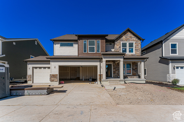 View of front of property featuring a porch