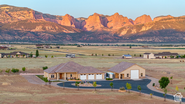 Property view of mountains with a rural view