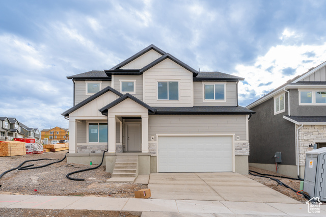 Craftsman inspired home with a garage