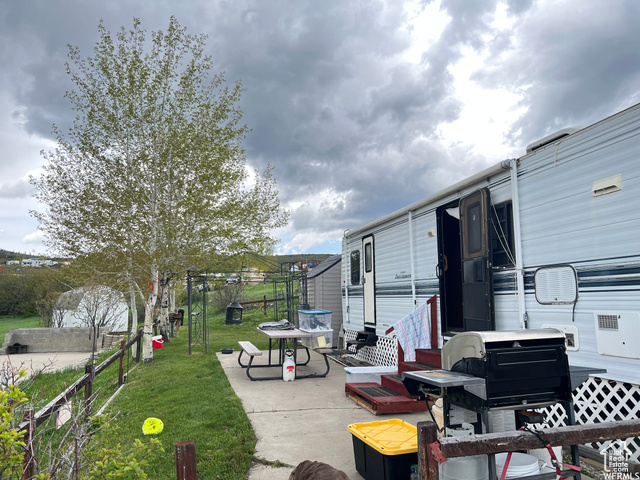 Beautiful improved rv lot including trailer, shed and all equipment to use the day you buy it! Plenty of space to add another RV or have plenty of parking. Borders common space allowing for privacy and added room to play!