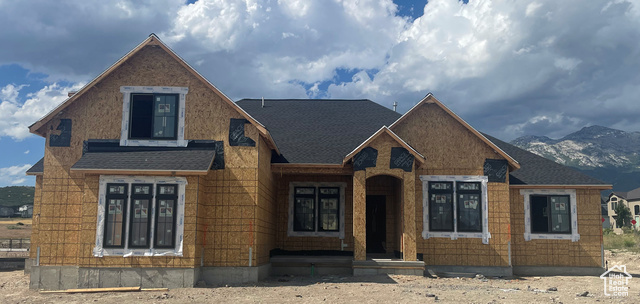 Property in mid-construction with a mountain view