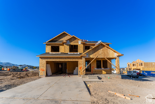 Property in mid-construction with a mountain view