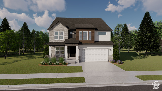 View of front of property with a garage and a front lawn