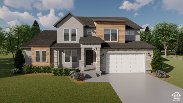 View of front facade with a garage and a front lawn