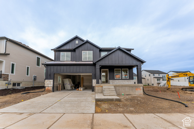 View of front of house featuring covered porch