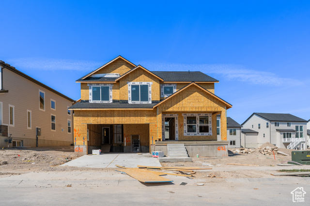 View of front of house with covered porch