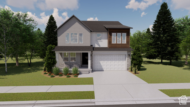 View of front of house featuring a garage and a front yard