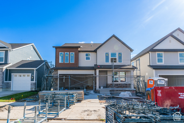 View of front of house with a garage