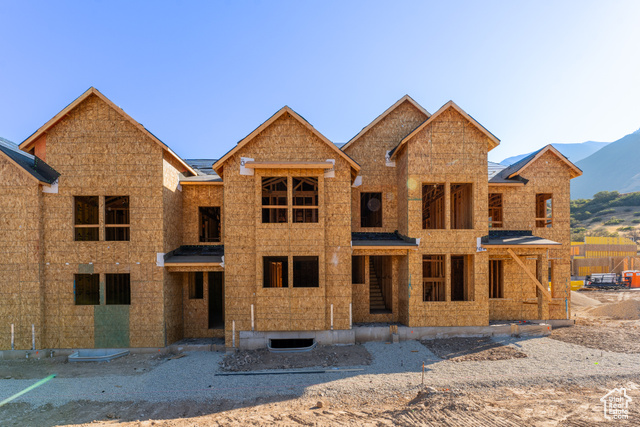 Unfinished property featuring a mountain view