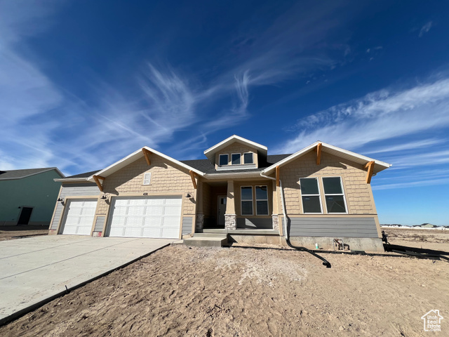 View of front of house with a garage