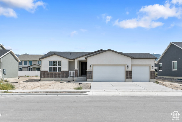 View of front of home with a garage