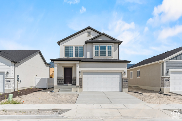 View of front of home with a garage