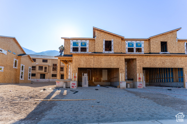 Property in mid-construction featuring a mountain view