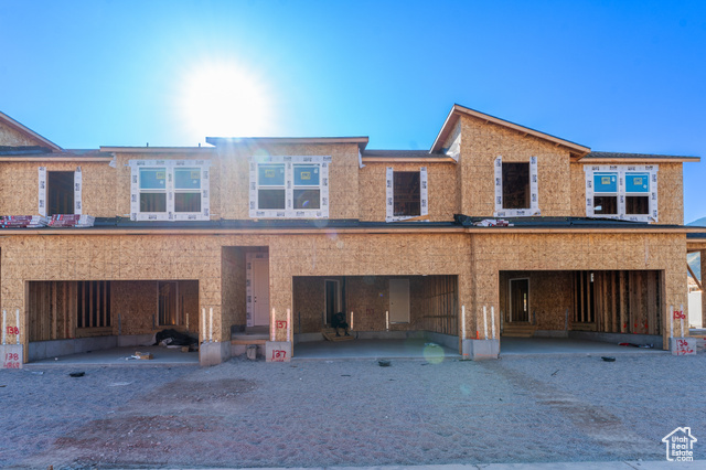 View of front of home featuring a carport