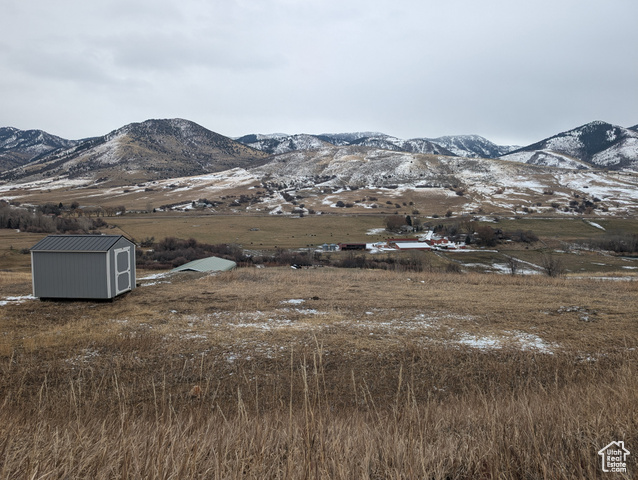 Property view of mountains and new well pump house