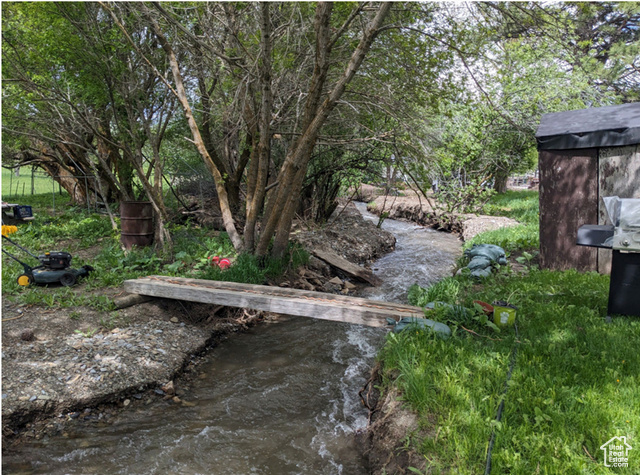 View of yard featuring a water view