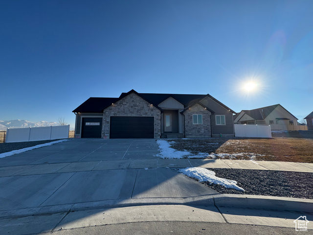 View of front of home featuring a garage