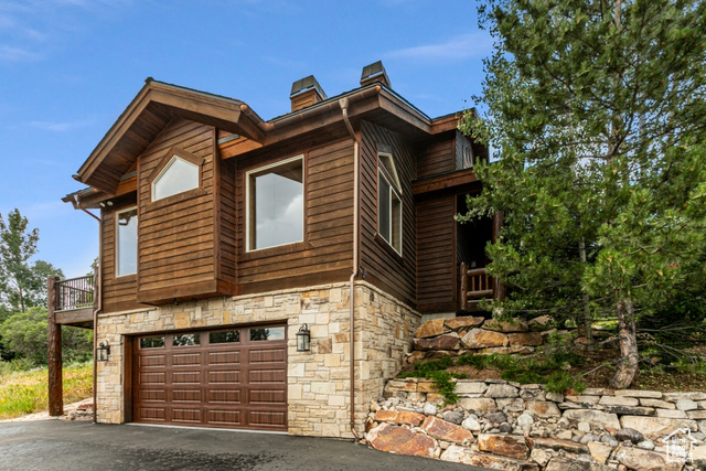 Exterior space featuring a garage