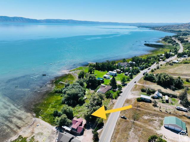 101 feet of beautiful Bear Lake waterfront! Two different parcels being sold as one including one water hook up. No Hoa or restrictions vrbo approved. Build a beach house, park an rv, or simply as an investment opportunity! Could also be used. for your own private beach access with the growing demand for Bear Lake Beach if you already own a hillside home! Buy and share with a group of neighbors! The possibilities are endless!