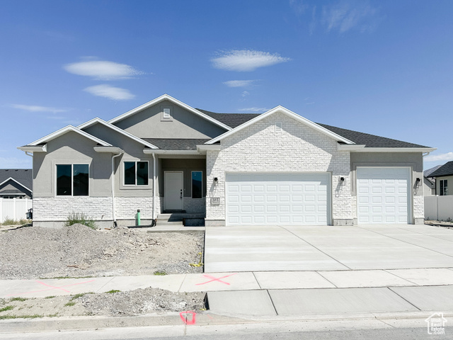 View of front of property with a garage