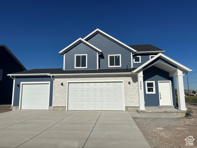 View of front of house with a garage