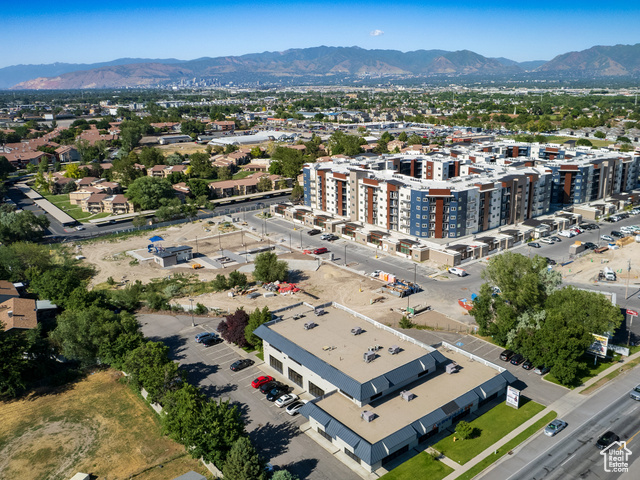 Birds eye view of property with a mountain view