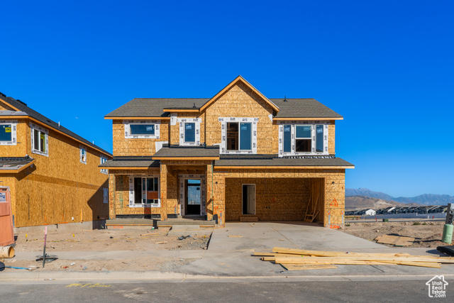 View of front of property with a mountain view