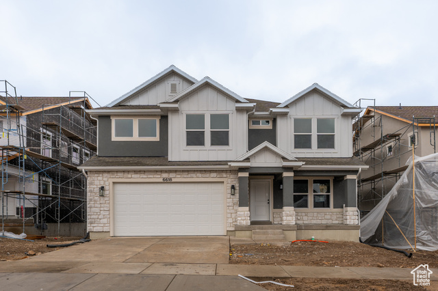 View of front facade with a garage