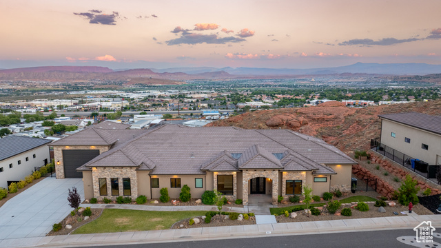 Aerial view at dusk with a mountain view