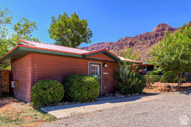 Single story home featuring a mountain view