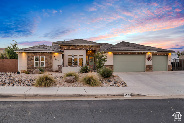 Prairie-style house with a garage