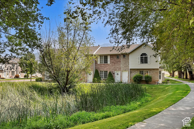 View of front of house with a front yard