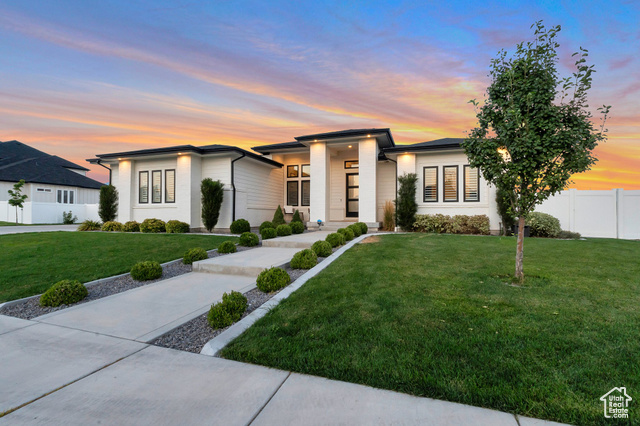 Prairie-style house with a yard