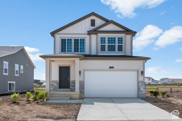 View of front of property with a garage