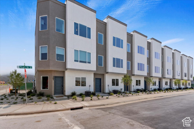 Collection of contemporary condo-style townhomes featuring 2 MasterSuites, 2 Car garages & stainless appliances!