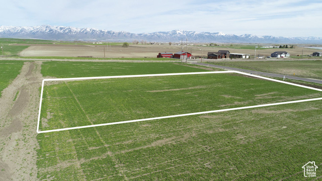 View of sport court featuring a rural view and a mountain view