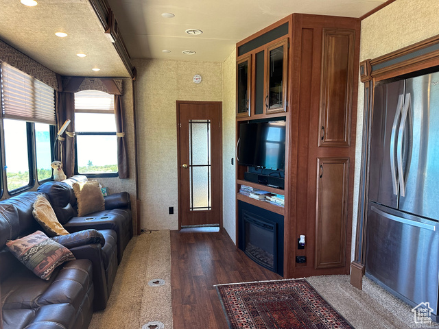 Living room featuring dark hardwood / wood-style floors