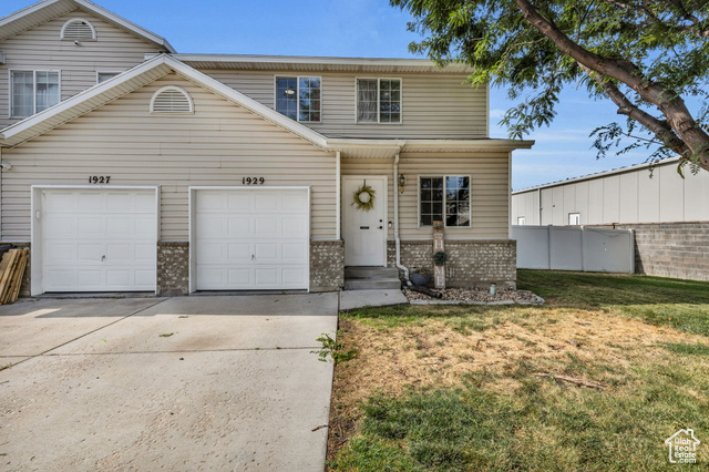 View of front of house with a front lawn