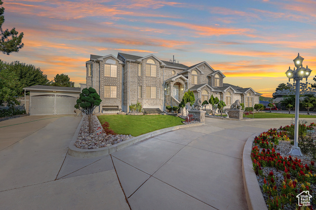 View of front of property with a garage