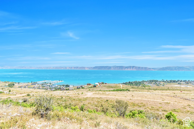 Property view of water with a mountain view