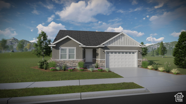 Craftsman-style house featuring a mountain view, a garage, and a front lawn