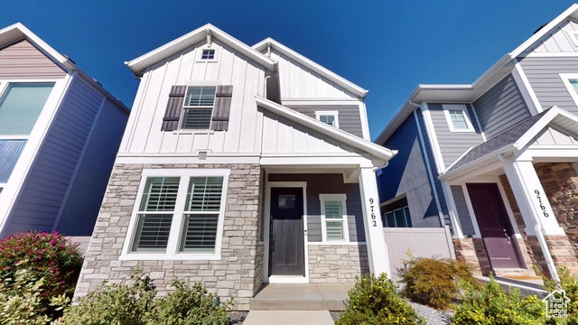 View of front of property with a porch