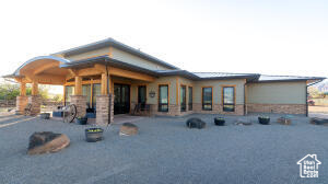 Rear view of house with a patio area