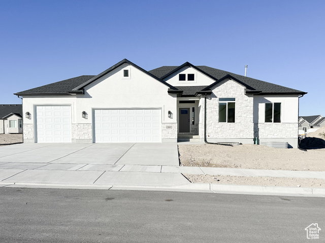 View of front of house with a garage