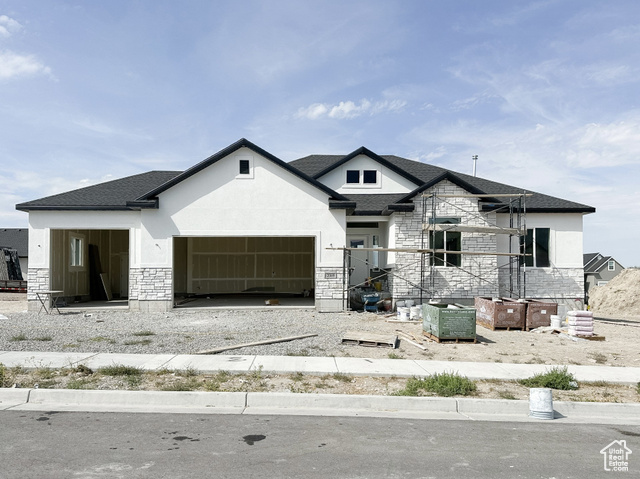 View of front of house with a garage