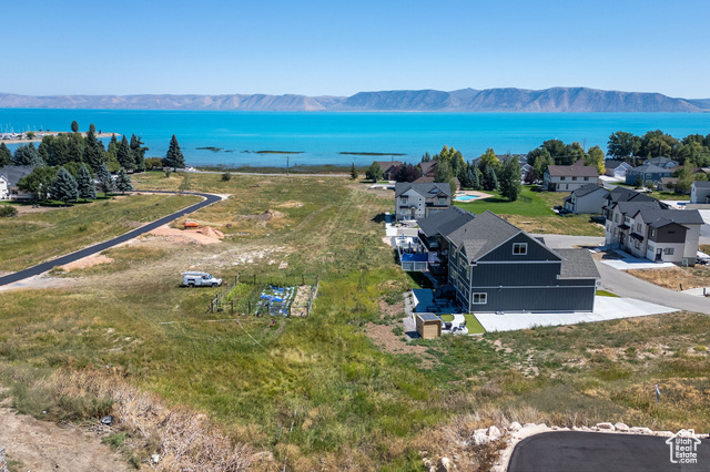 Bird's eye view featuring a water and mountain view