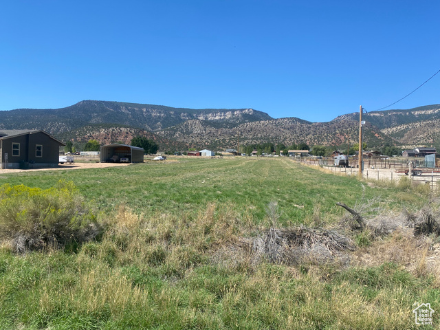 Property view of mountains featuring a rural view