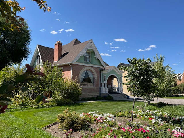 The  front of home with beautiful landscaping